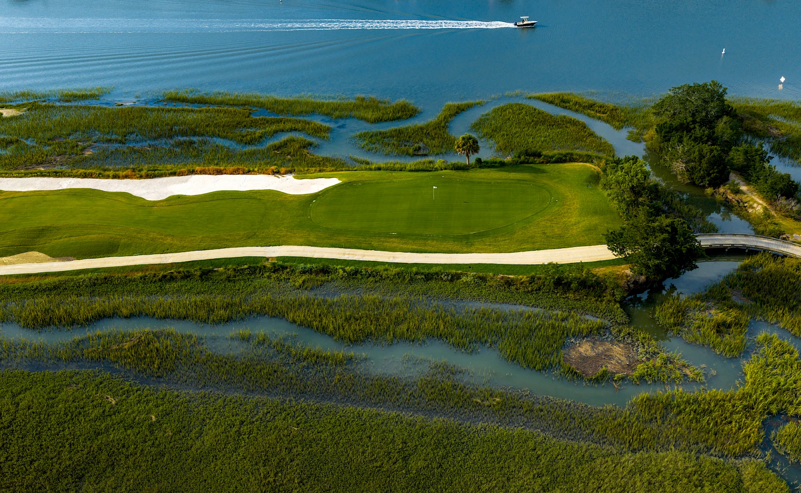 11th hole Harbor Course aerial — marsh, harbor, and palmetto at Wild Dunes