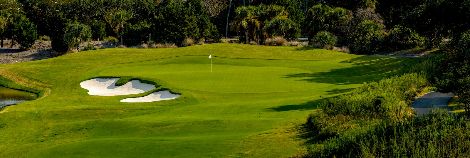 3rd hole Harbor Course — green with bunkers and lowcountry marsh surrounds